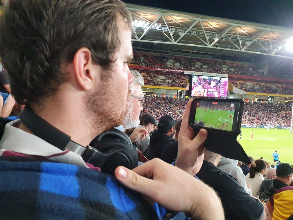 A Sunshine Connect participant attending a live sporting event