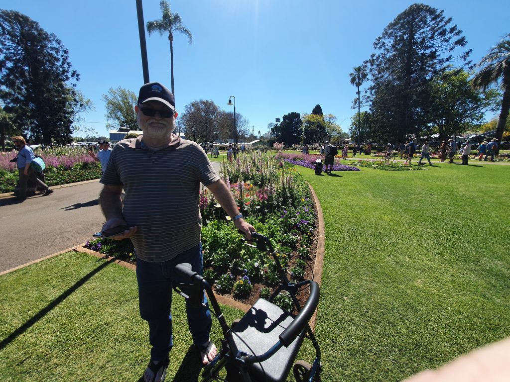 A Sunshine Connect participant enjoying a community garden visit